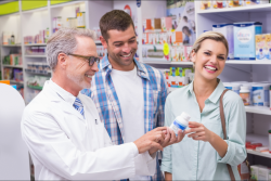 customers and pharmacist laughing